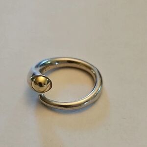 Elegant Silver and Gold-Tone Ring